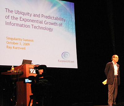 Ray Kurzweil on the stage at the 2009 Singularity Summit